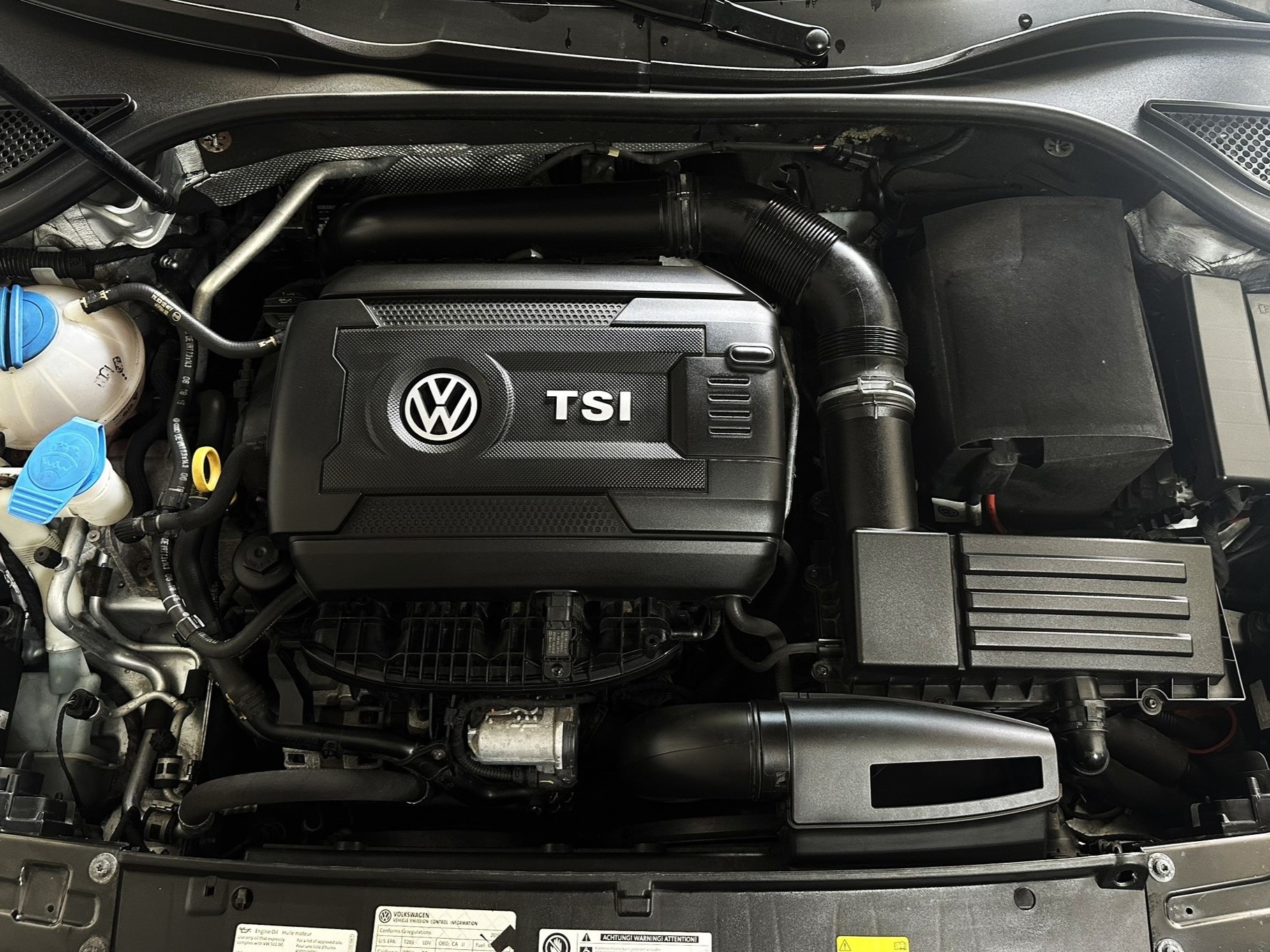 Clean black car engine bay